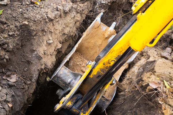 Cost of Downspout Trenching in Sherman
